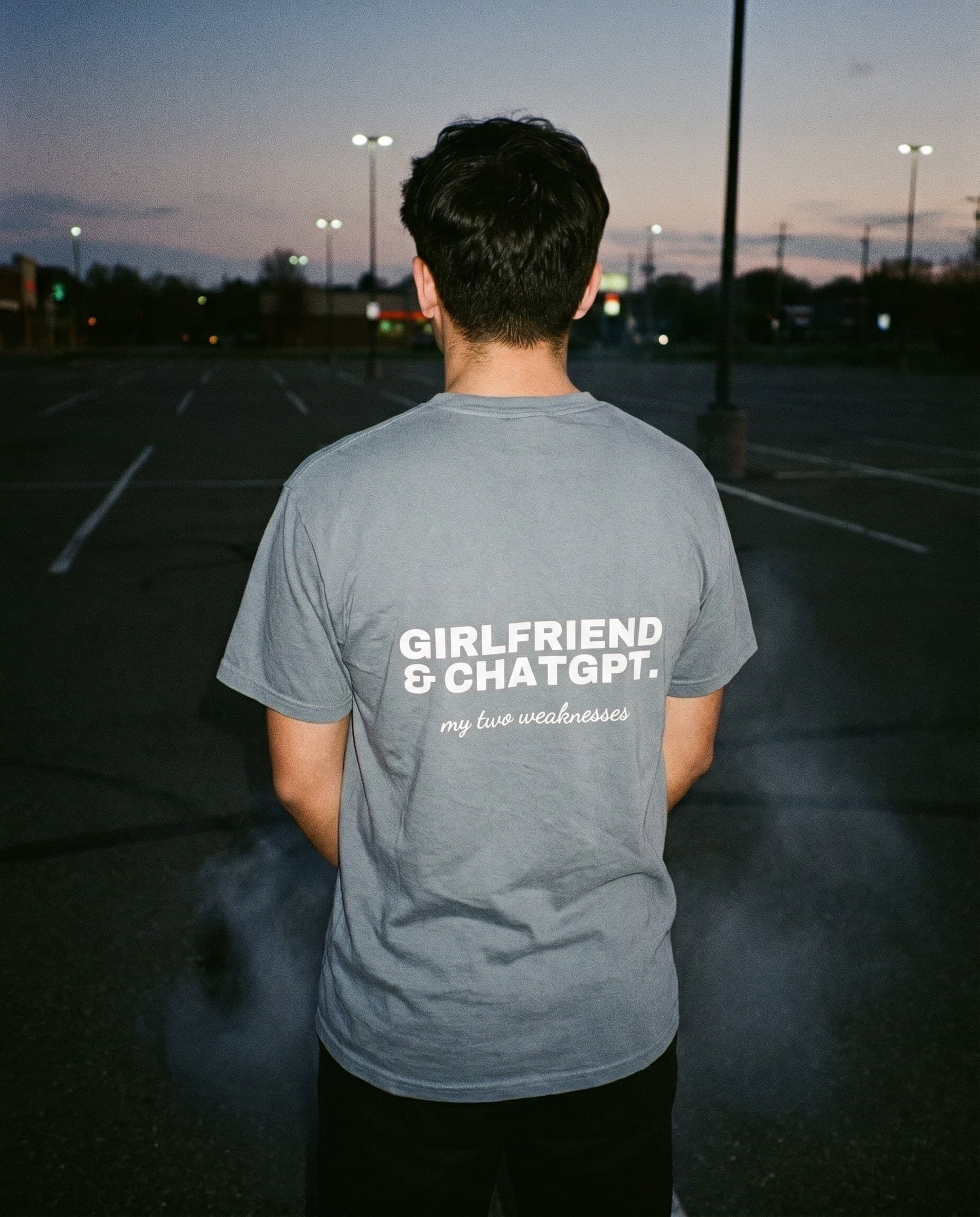 Back view of the "GIRLFRIEND & CHATGPT. my two weaknesses" tee